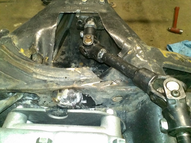091-1, 094 shift linkage showing u-joints and rear shift rod support