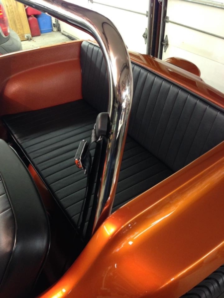 back seat, finished stainless steel rollbar